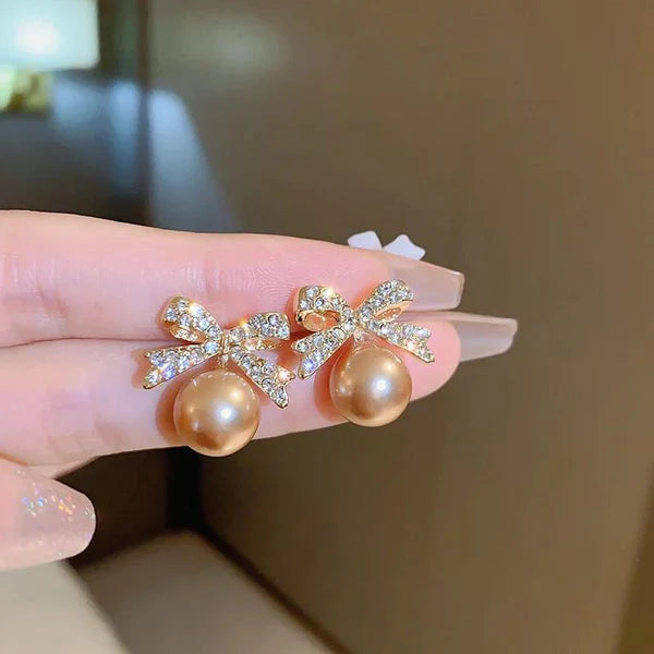 Gold Shiny Bow-Tie Pearl Earrings