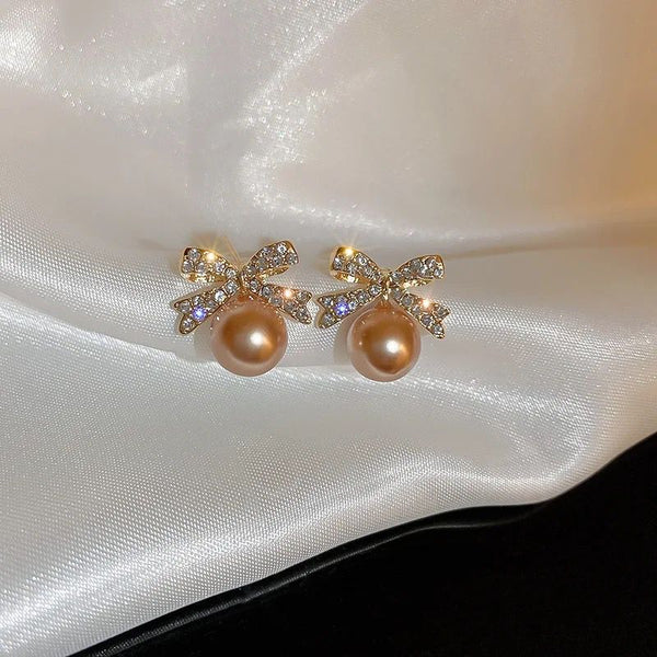Gold Shiny Bow-Tie Pearl Earrings